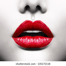 Sexy Lips. Black and White Conceptual Image with Vivid Red Open Mouth. Makeup