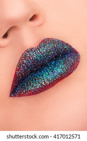 Sexy Lips with glitter. Beauty Red Lip Makeup Detail. Beautiful Make-up Closeup. Sensual Open Mouth. lipstick or Lipgloss. Kiss. Passionate red lips,macro photography.