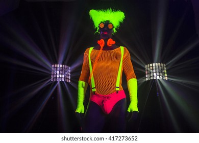 Sexy Male Disco Dancer Poses In UV Costume