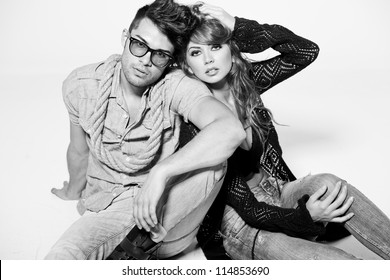 Sexy Man And Woman Doing A Fashion Photo Shoot In A Professional Studio - Bw Retro Mood