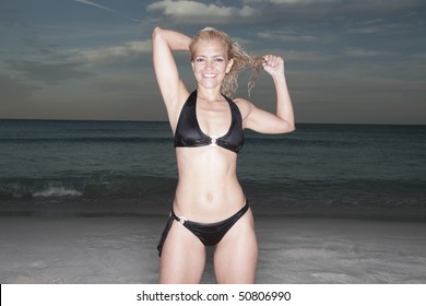Sexy mature woman in a bikini shot with ring flash