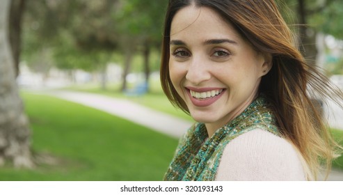 Sexy Mexican woman smiling at camera 