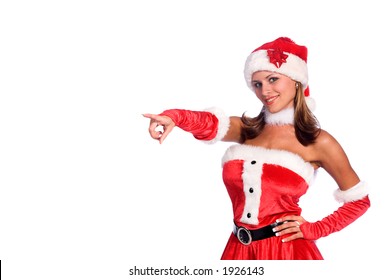 Sexy Ms. Santa Claus Pointing With Copy Space