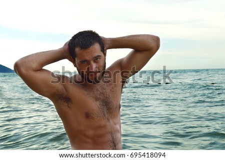 Sexy Muscular Handsome Man Standing On The Ocean Beach Hot Fitness Male Model Men Muscle Sexy Muscular Handsome Man Standing On The Ocean Beach Hot Fitness Male Model Men Muscle