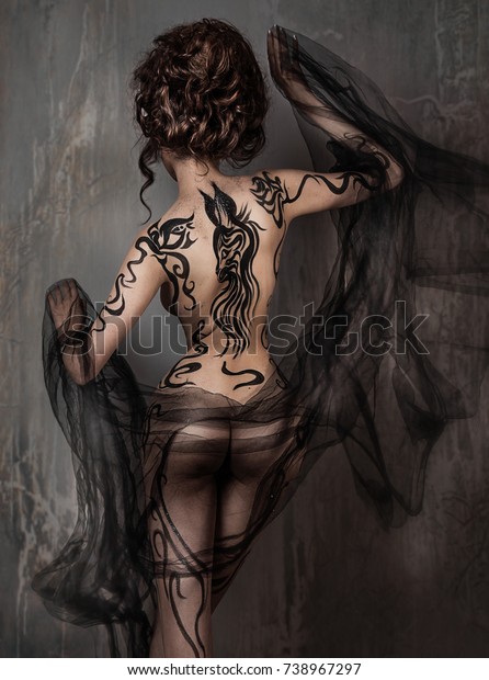 Dark nude warrior woman