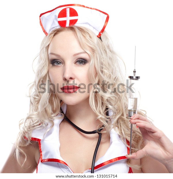 The Sexy Nurse With Syringe Isolated On White Background 