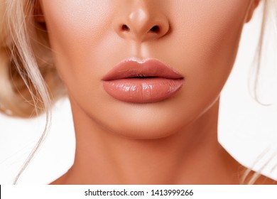 Sexy plump Lips Close-up.  Lip Gloss. Beautiful  Perfect Makeup. Beautiful lips. Beauty. Cosmetic lips. Cosmetic beauty procedures. - image       