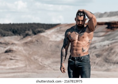 Sexy Portrait Of Muscular Handsome Topless Male Model At The Beach.