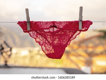 Sexy Red Knickers Hanging On A Washing Line