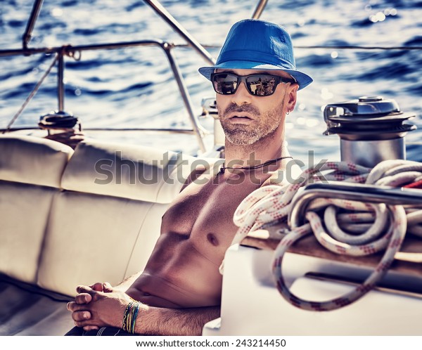 Sexy Sailor Man On Sailboat Enjoying Stock Photo Edit Now