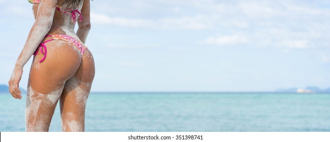 Sexy Sandy Woman Buttocks On The Beach Background. Wide Banner.