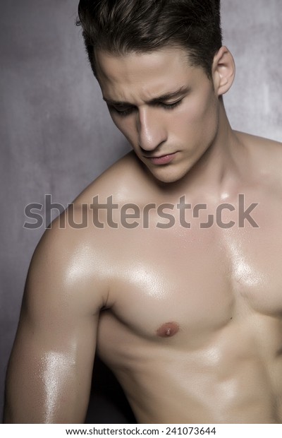 Стоковая фотография 241073644 Sexy Shirtless Male Model Flirting Against Shutterstock 0151