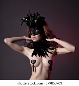 Sexy Slim Woman, Burlesque Dancer, Unrecognizable Stripper In Mask And Feathers