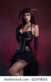 Sexy succubus or demon girl with horns, Halloween theme 