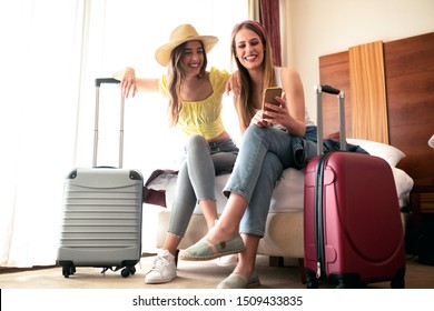 Sexy Traveling Girls And Their Luggage In A Hotel Room