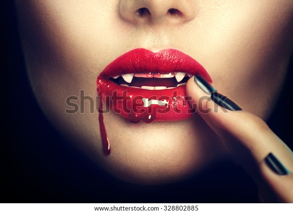 Sexy Vampire Woman lips with blood. Fashion\
Glamour Halloween art design. Dripping blood on mouth. Vampire\
makeup Fashion Art design.