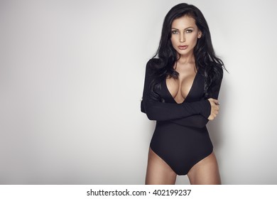 sexy woman in black body at white background