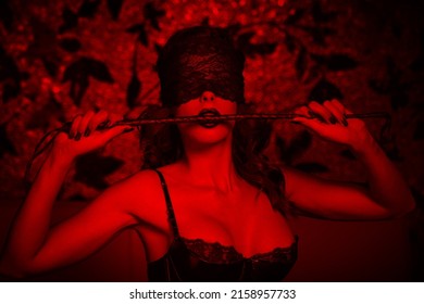 Sexy Woman In Blindfold Bite Whip In Red Light, Lace Eye Cover, Bdsm