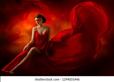 Sexy Woman in Carnival Mask, Fashion Model in Sensual Dress, Flying Fluttering Red Fabric - Shutterstock ID 1294031446