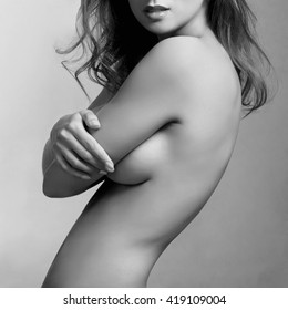 sexy woman covers her breast. perfect nude body girl