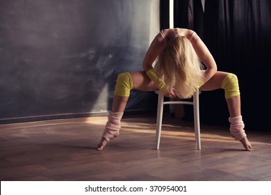 Sexy woman dancing on the chair