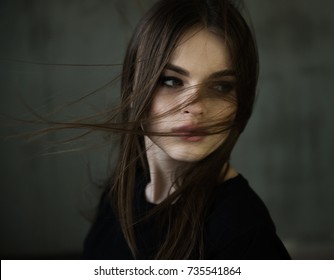 sexy woman face with wind in hair