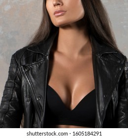 Sexy Woman Part Of Body, Cleavage, Black Lingerie, Leather Jacket