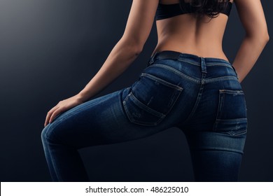 Sexy woman in skinny denim pants, pretty women 's butt in slim fit tight jeans.