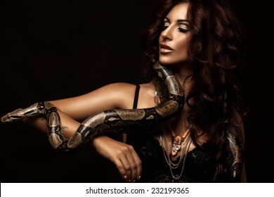 Sexy woman with a snake