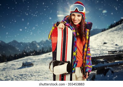 Sexy Woman With Snowboard Outdoors