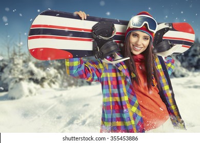 Sexy Woman With Snowboard Outdoors