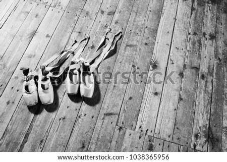 shabby ballet pointe closeup on a wooden background