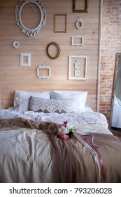 Shabby Chic Interior Decor The Bedroom Is In The Style Of Provence Wooden Wall Decorated With Photo Frames.