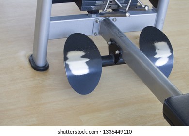 
Shabby Metal Footrest On A Fitness Machine. 
Depreciation Of Equipment Concept