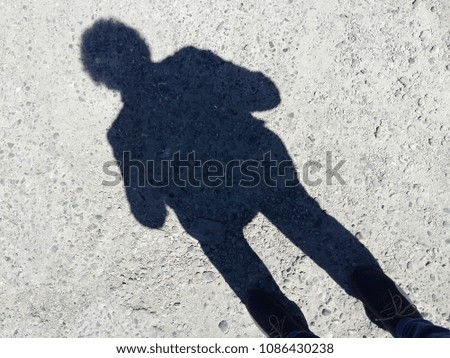 Similar – Shadow of a woman on the beach