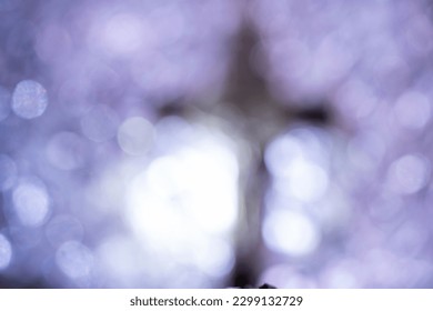 shadow of crucifix cross in blur bokeh background for inspiration - Powered by Shutterstock