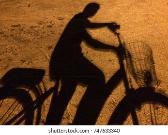Shadow of cyclist