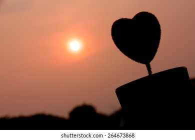 The Shadow of heart with sunset