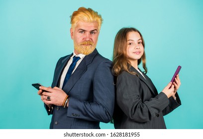 Shadow Internet. Bearded Dad Dyed Hair. Kid Oversized Jacket. Business People Using Devices. Successful Family Team. Entrepreneurship. Business Discussion. Businessman Speak On Phone With Small Girl.