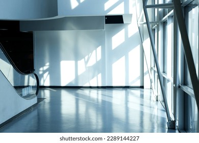 shadow and light reflection inside the building view and moving escalator