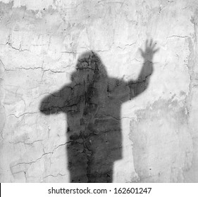 Shadow Of A Man On The Wall