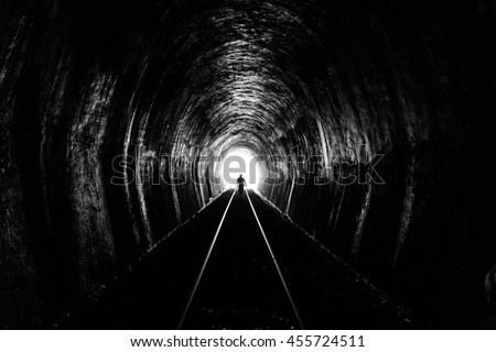 Shadow of Man Standing in the Train Tunnel