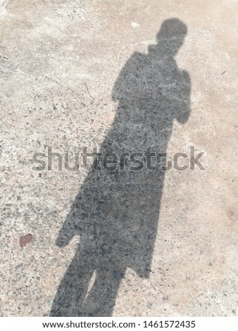 Similar – Shadow of a woman on the beach