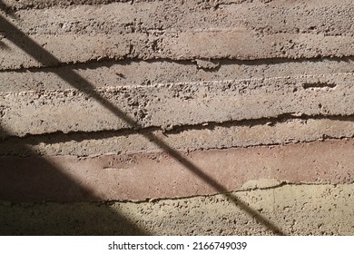 Shadow On The Rammed Earth Wall.