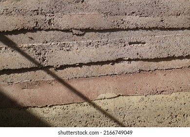 Shadow On The Rammed Earth Wall.