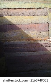 Shadow On The Rammed Earth Wall.