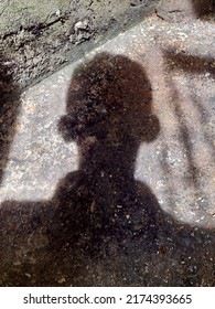 Shadow Of Someone Basking In The Sun, To Get Ultra Violet Rays