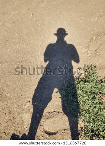 Similar – Shadow of a woman on the beach