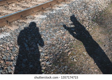 Shadow of two guys