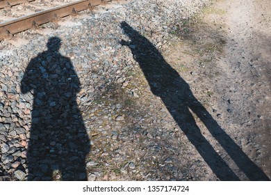 Shadow of two guys